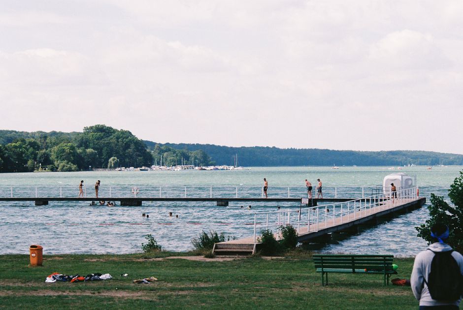 Family enjoying a lakeside beach